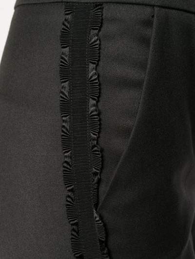 Shop Blumarine Ruffle-trimmed Trousers In Black