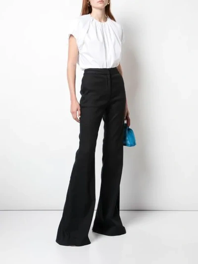 Shop Adam Lippes Flared Trousers In Black