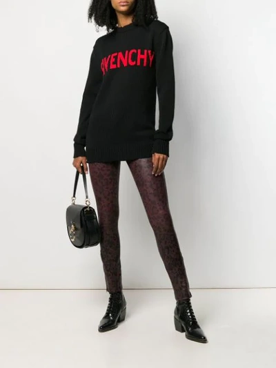 Shop Givenchy Contrasting Logo Jumper In Black