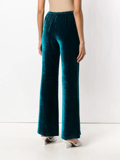 Shop Etro Flared Trousers - Blue