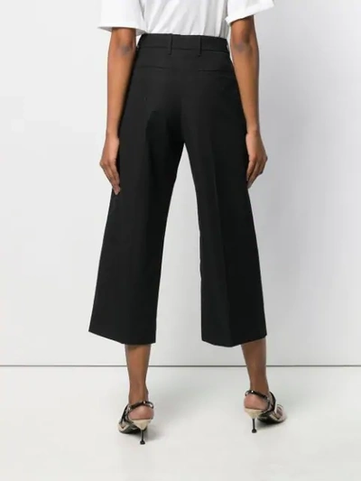 Shop Prada Cropped Wide Leg Trousers In Black