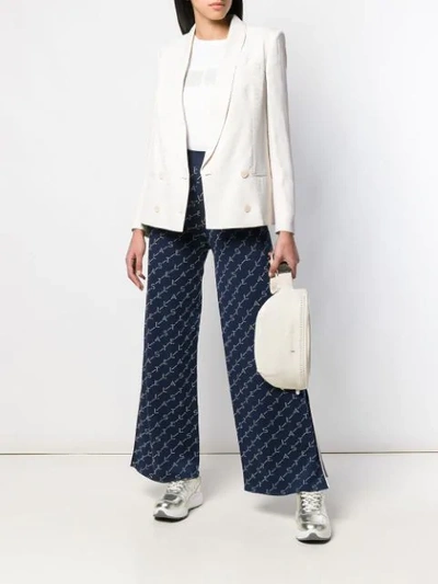 Shop Stella Mccartney Wide Leg Monogram Trousers In Blue