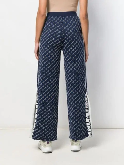 Shop Stella Mccartney Wide Leg Monogram Trousers In Blue