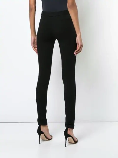 Shop Roberto Cavalli Skinny Side Zip Trousers In Black
