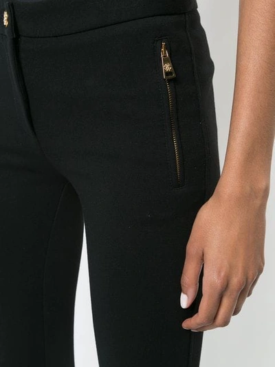 Shop Roberto Cavalli Skinny Side Zip Trousers In Black