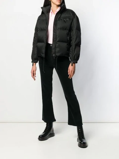 Shop Prada Zipped Nylon Puffer Jacket In Black