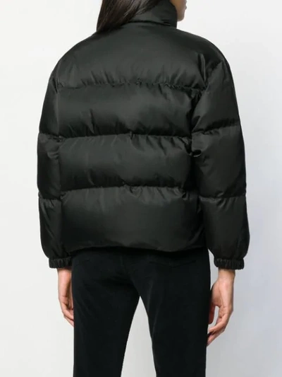 Shop Prada Zipped Nylon Puffer Jacket In Black
