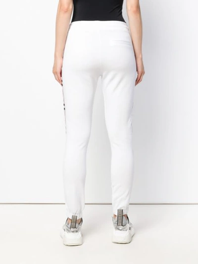 Shop Zoe Karssen Side-stripe Track Trousers - White