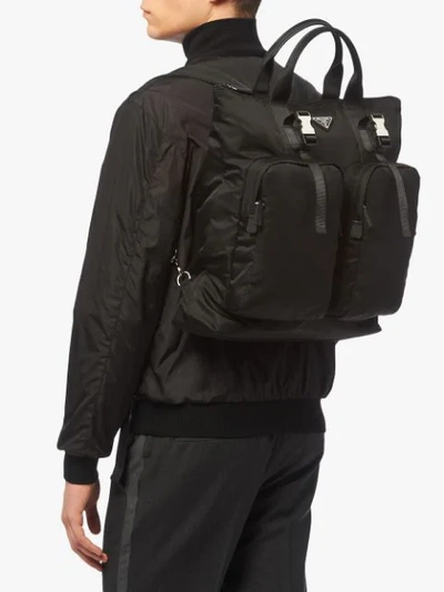 Shop Prada Logo Plaque Tote Backpack In Black