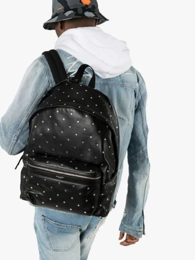 Shop Saint Laurent Star-embossed Backpack In Black