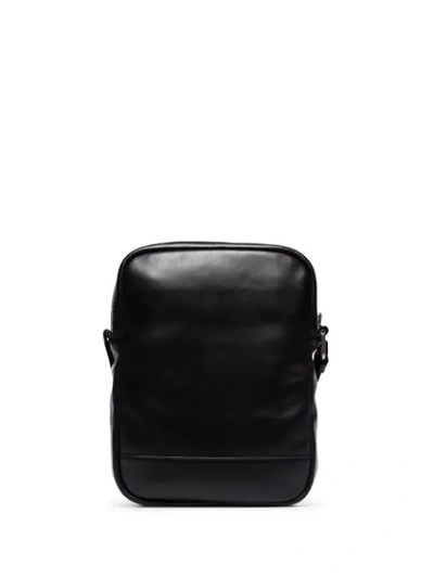 Shop Saint Laurent Logo Plaque Shoulder Bag - Black