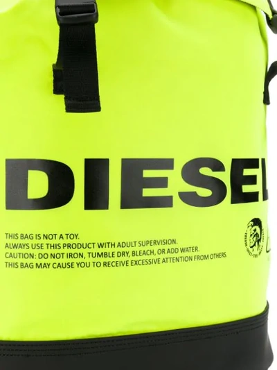 Shop Diesel Neon Logo Warning Backpack In H5221 Yellow