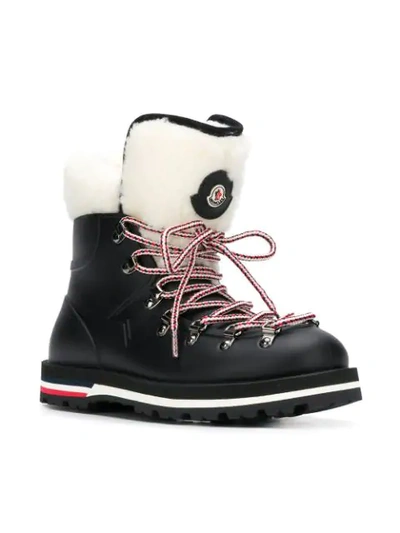 Shop Moncler Shearling Cuffs Lace-up Boots - Black