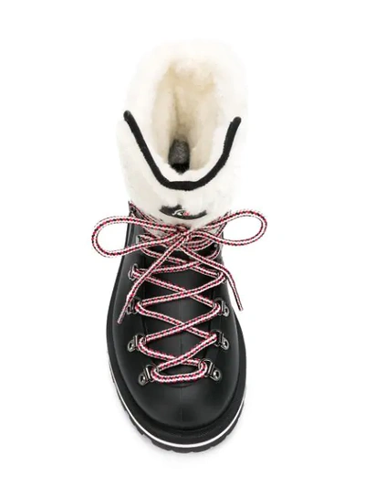 Shop Moncler Shearling Cuffs Lace-up Boots - Black