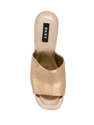 Shop Dkny Bronx Square Toe Mules - Gold