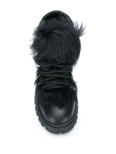 Shop Prada Shearling Trim Boots In Black