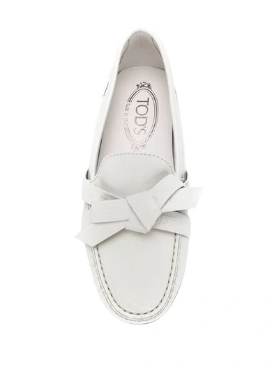Shop Tod's Bow Detail Loafers In B001 White