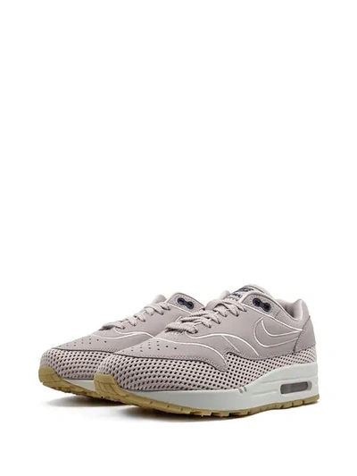 Shop Nike Air Max 1 Sneakers In Pink