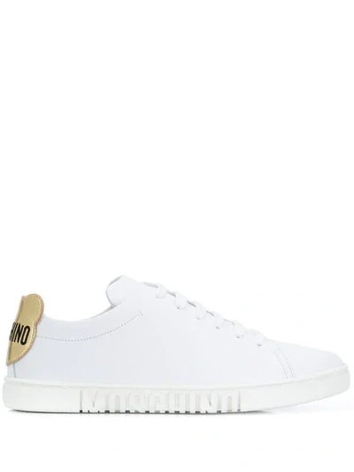 Shop Moschino Monogram Sole Sneakers In White