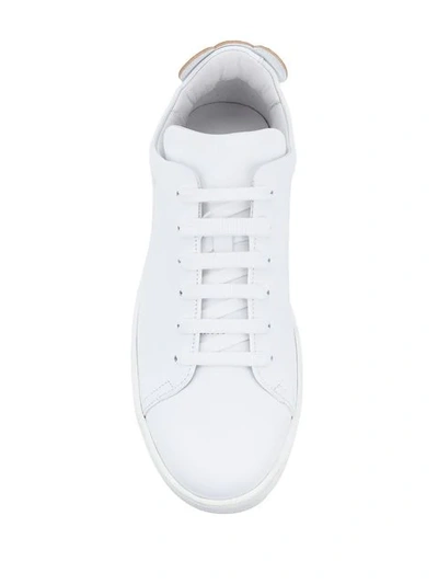 Shop Moschino Monogram Sole Sneakers In White