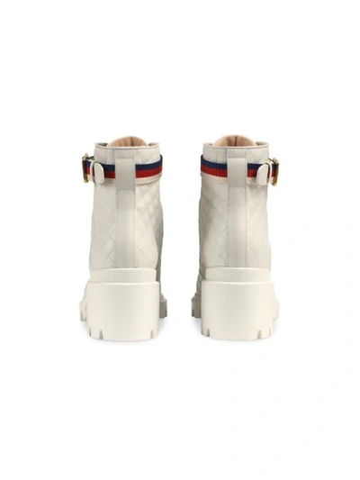 Shop Gucci Quilted Leather Ankle Boot With Belt In White