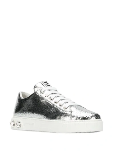 Shop Miu Miu Embellished Metallic Sneakers In Silver