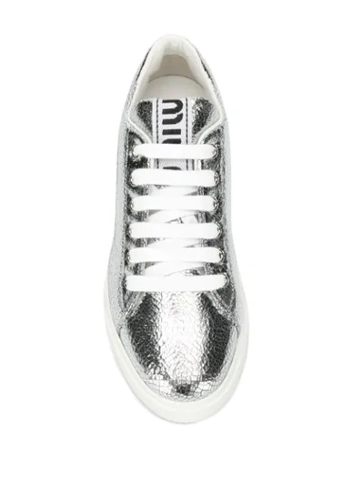 Shop Miu Miu Embellished Metallic Sneakers In Silver