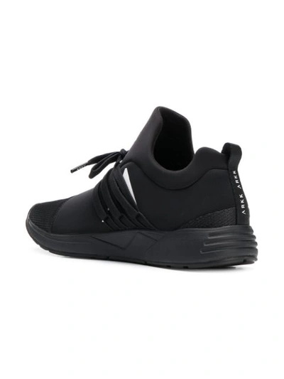 Shop Arkk Low Top Sneakers In Black