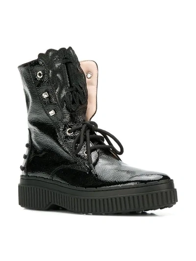 Shop Tod's Studded Military Boots In B999 Black