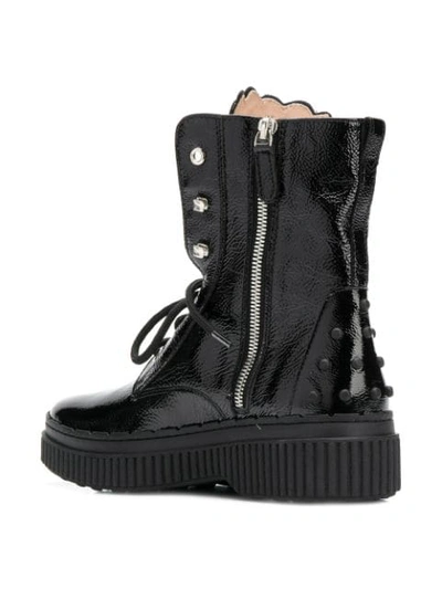 Shop Tod's Studded Military Boots In B999 Black
