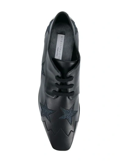 Shop Stella Mccartney Elyse Star Sneakers In Black
