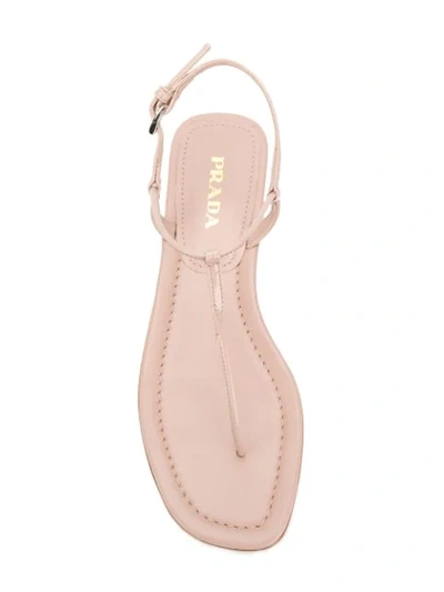 Shop Prada Thong Sandals - Neutrals