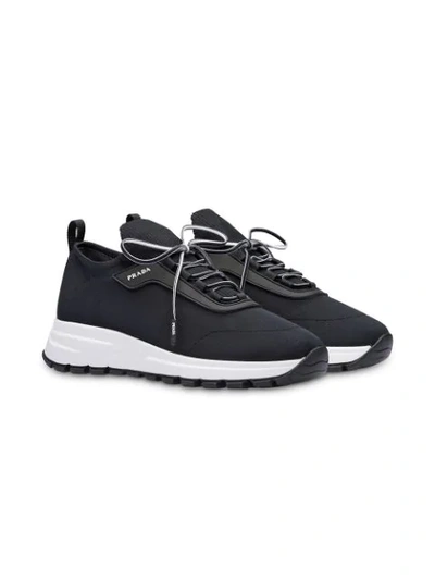 Shop Prada Stretch-knit Sneakers In F0967 Black/white