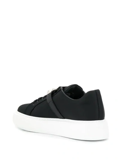 Shop Prada Buckle Sneakers - Black