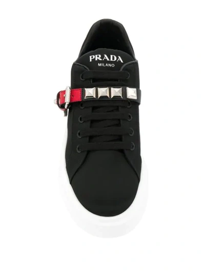 Shop Prada Buckle Sneakers - Black