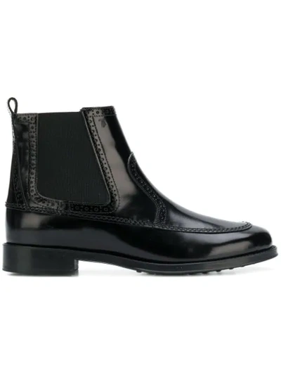 Shop Tod's Perforated Trimmed Ankle Boots In 999 Black