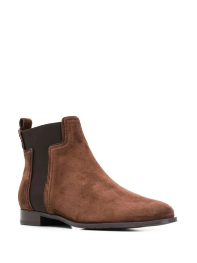 Shop Tod's Flache Stiefeletten In Brown