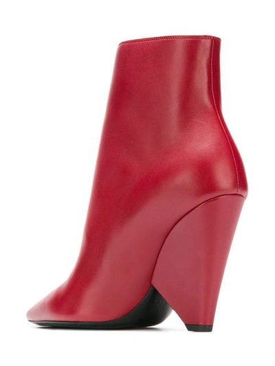 Shop Saint Laurent Niki 85 Asymmetric Boots In 6750 Red