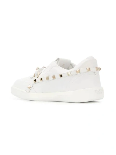 Shop Valentino Garavani Rockstud Sneakers