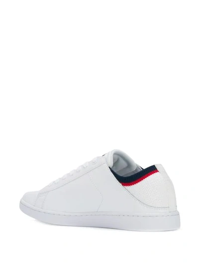 Shop Lacoste Slip-on Logo Sneakers In White
