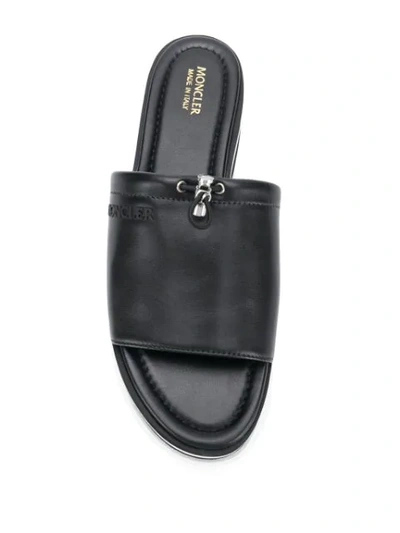 Shop Moncler Flat Mules In Black