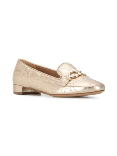 Shop Ferragamo Gancini Loafers In Gold