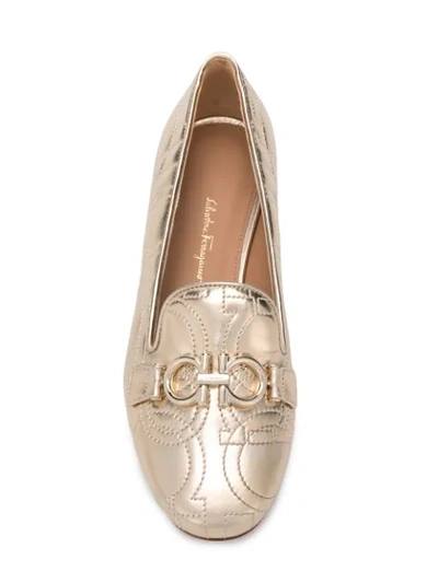 Shop Ferragamo Gancini Loafers In Gold