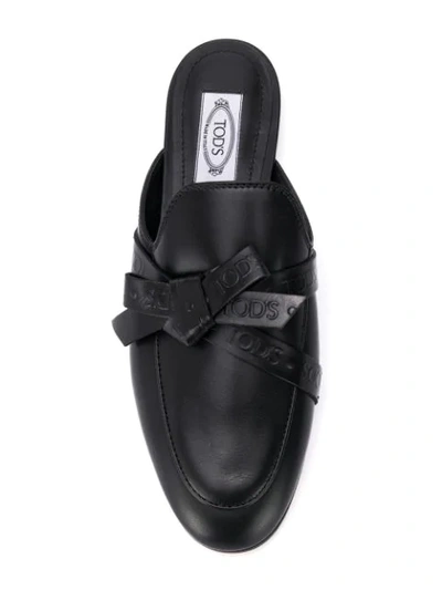 Tod's Branded Buckle Mules In Black