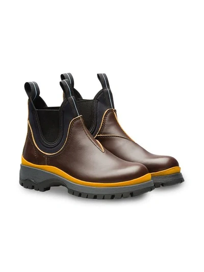 Shop Prada Ankle Boots In Brown