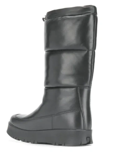 Shop Prada Leather Moon Boots In Black