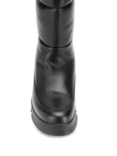 Shop Prada Leather Moon Boots In Black