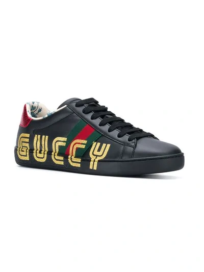 Shop Gucci Guccy Logo Sneakers In Black