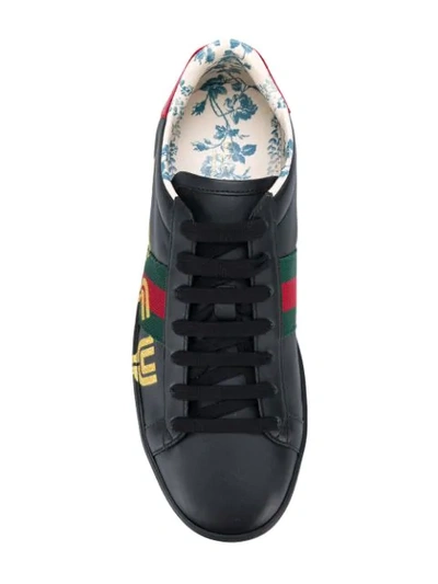 Shop Gucci Guccy Logo Sneakers In Black