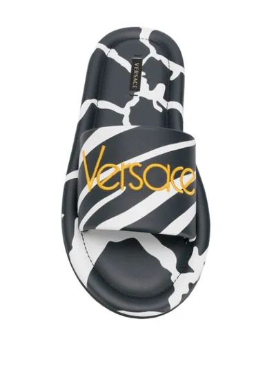 Shop Versace Animal Pattern Sandals  In Black ,white